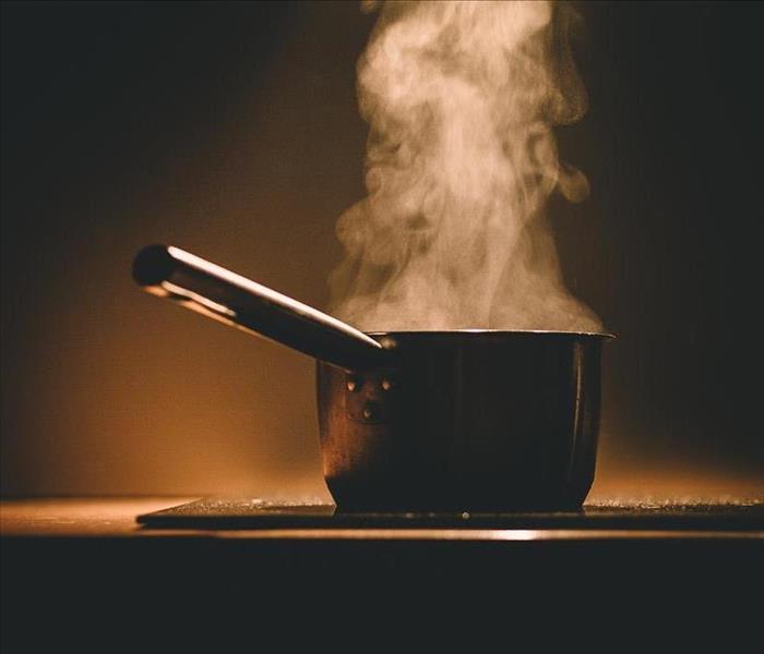 Pot on stove steaming